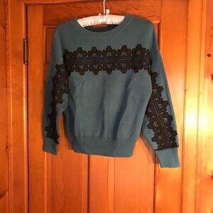 Teal Crew Neck Sweater with Black Lace Design, Size L-XL. Imported.